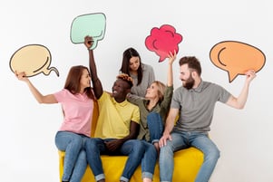 Group of friends with inclusive language bubbles